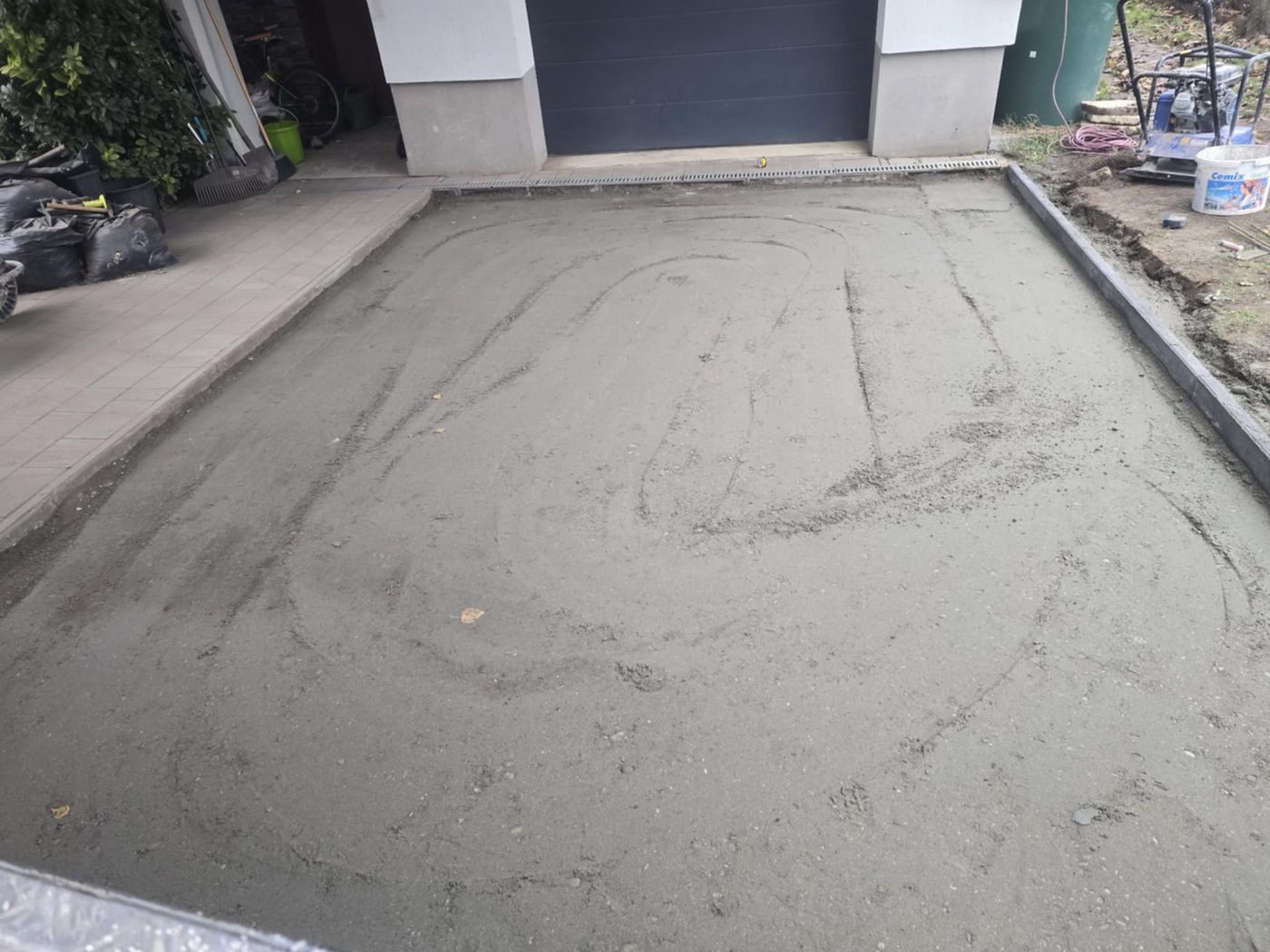 Cracked concrete slab that should be removed before paving