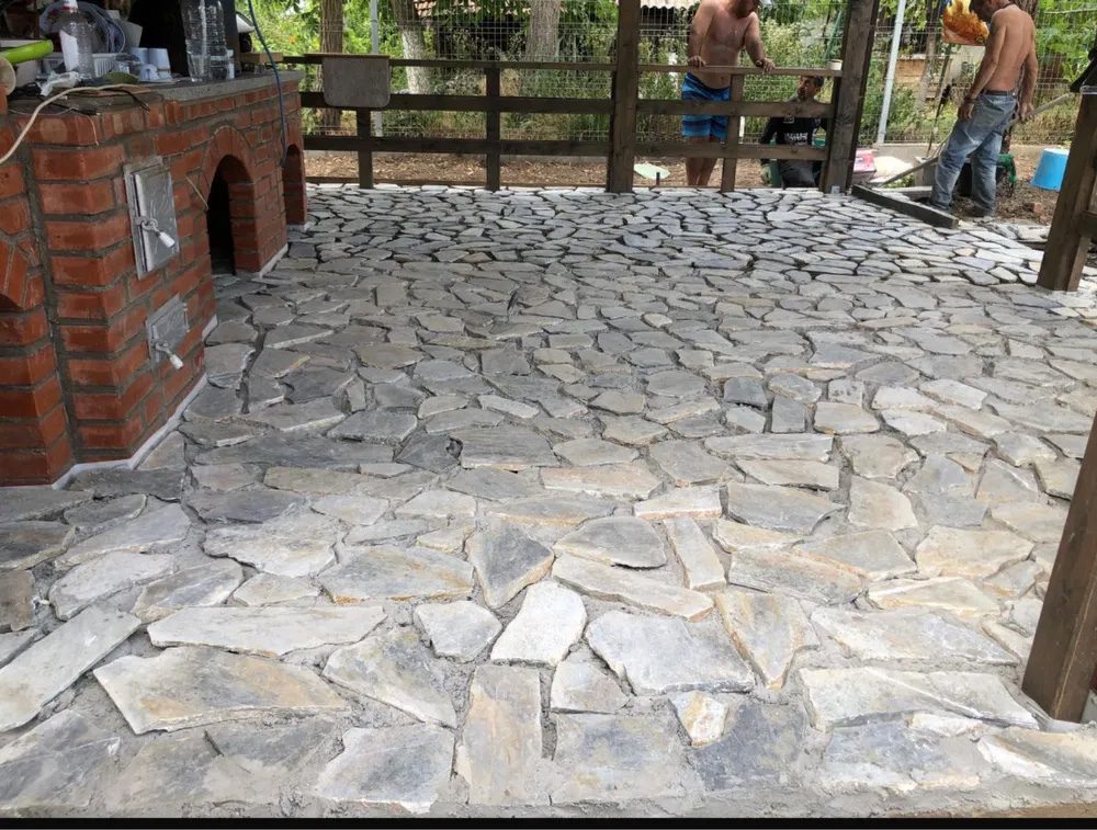 Aged pavers in a Mediterranean garden